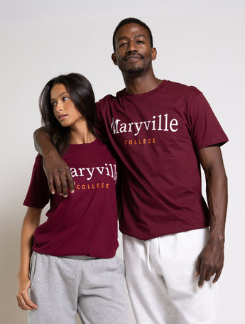 Two people wearing maroon 'Maryville College' t-shirts on a plain background